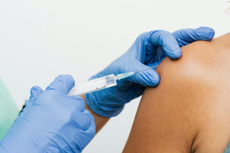 injectable flu vaccine being administered