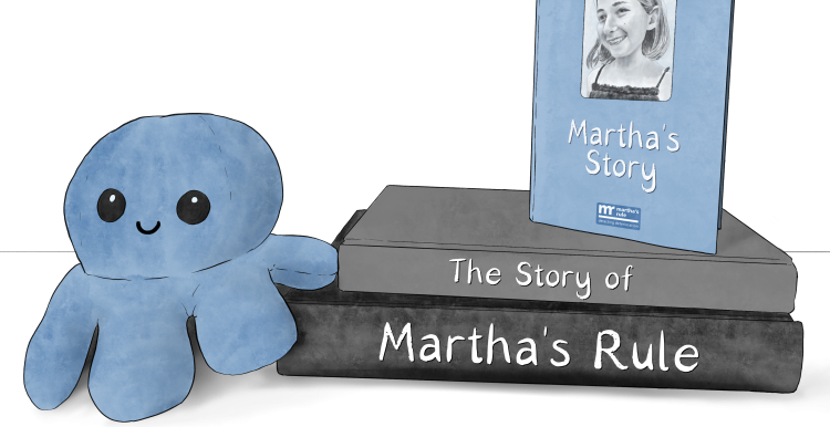 Blue octopus teddy next to a pile of books that say "the story of martha's rule"