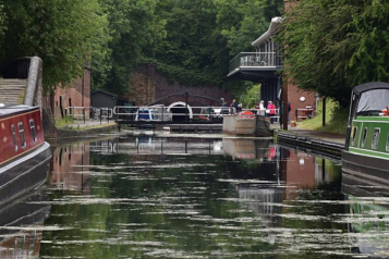 photo of boats on a canal