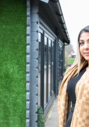 Healthwatch staff member standing outside